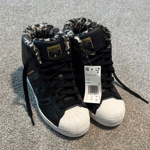 Adidas Women's Black and White Sneakers with Fur Trim